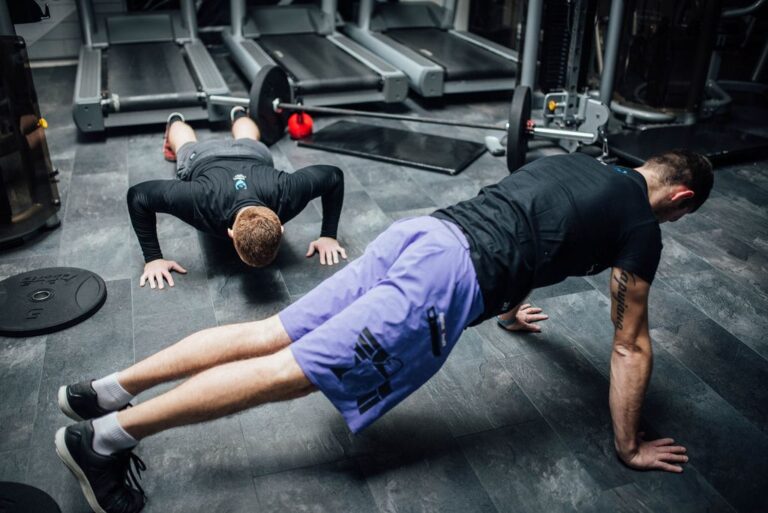 two-men-exercising-at-the-gym